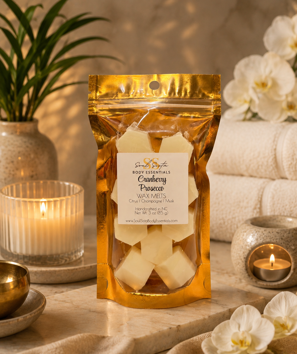 Soul Sista Body Essentials wax melts in a decorative container, showcasing colorful, scented wax pieces for home fragrance.