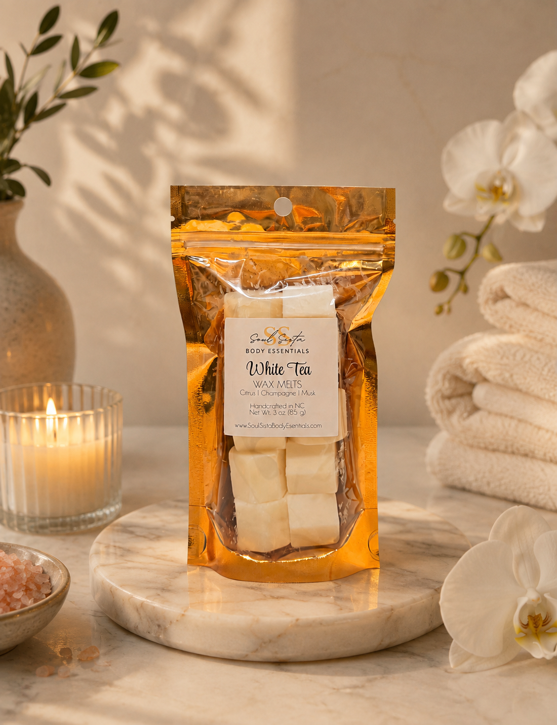 Wax melts from Soul Sista Body Essentials, featuring colorful fragrance pieces in a clear container with a lid.